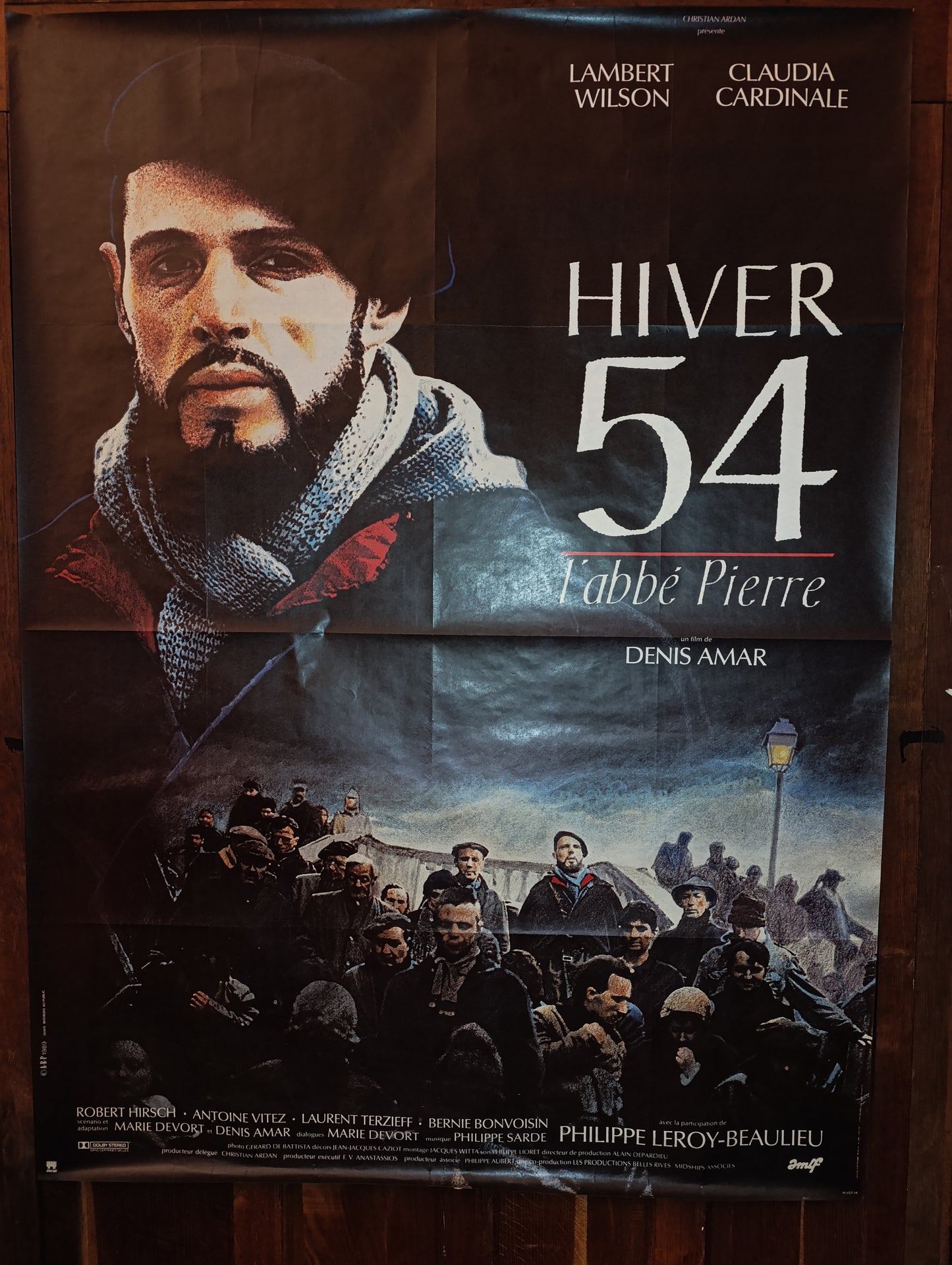 Affiche cinéma originale – Hiver 54, l’Abbé Pierre (1989) – Grand format 157×116 cm – Lambert Wilson / Claudia Cardinale – Non déchirée