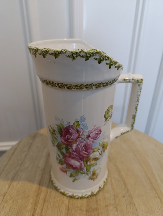 Ancien pichet fleuri en céramique à bordure verte