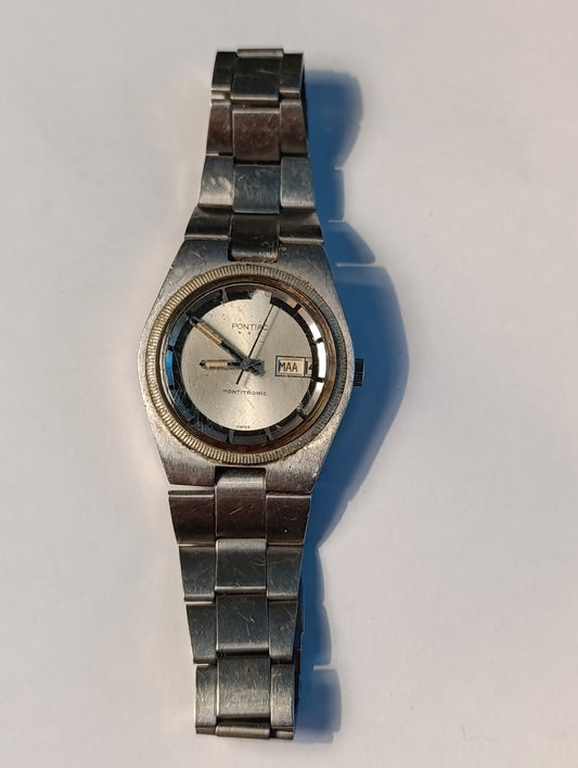 Montre Pontiac Pontitronic vintage acier avec jour