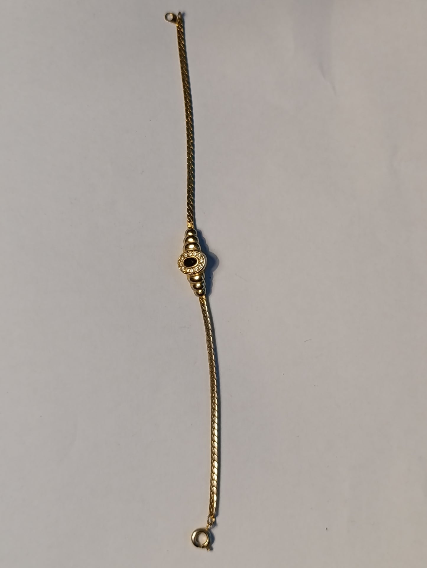 Bracelet fantaisie vintage doré à motif central strass et pierre noire