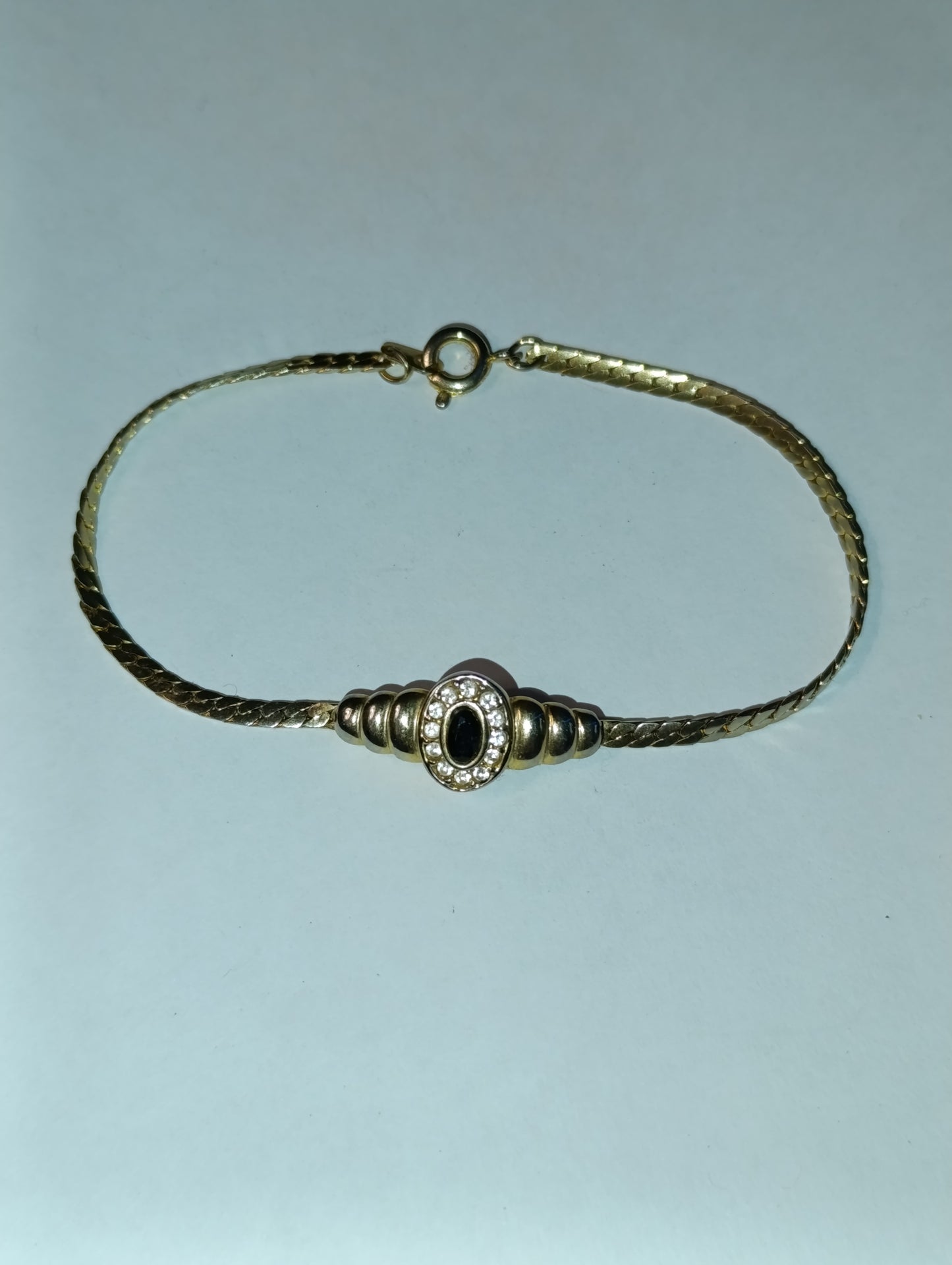 Bracelet fantaisie vintage doré à motif central strass et pierre noire