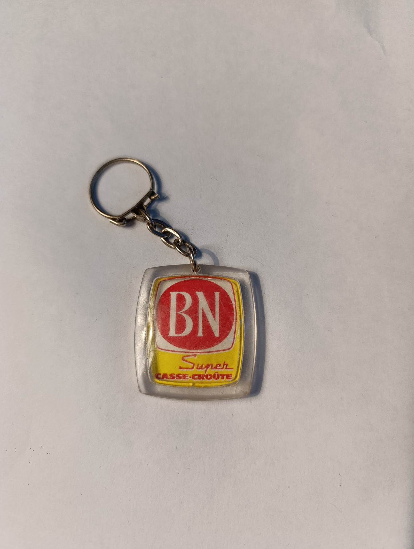 Porte-clés publicitaire vintage BN Super Casse-Croûte / astronaute Frank Borman
