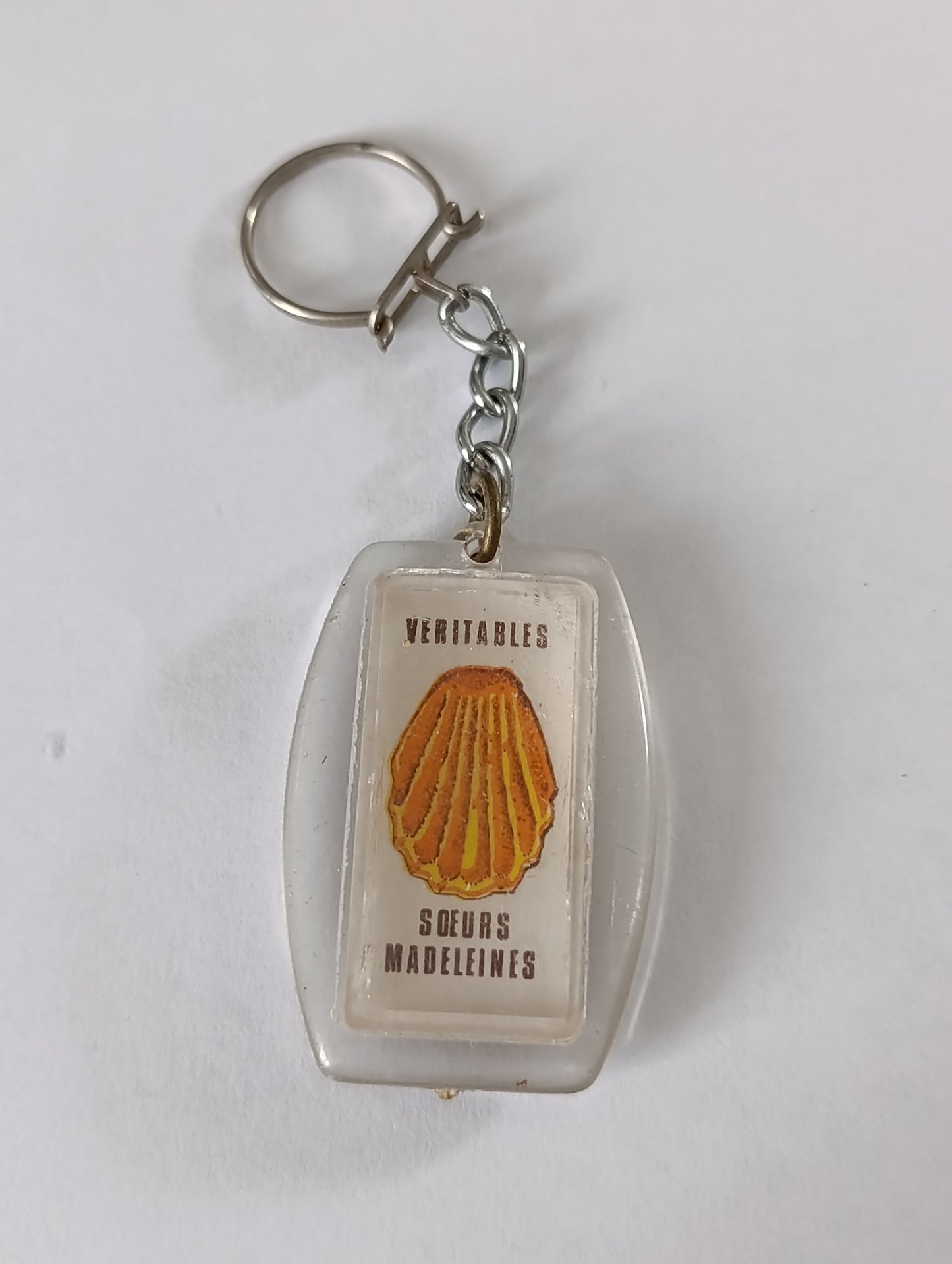 Porte-clés publicitaire ancien R. Jacobée Lerouville – Sœurs Madeleines