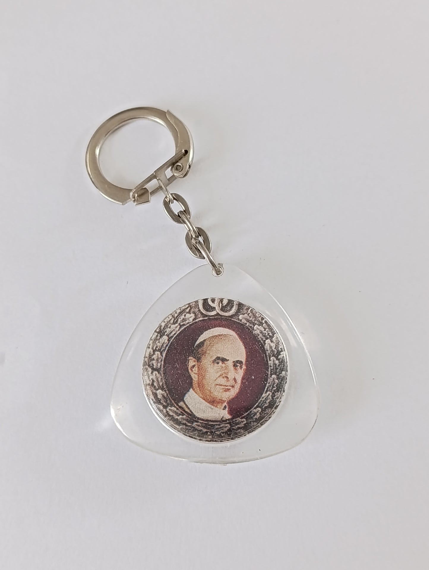 Porte-clés religieux ancien en plastique translucide, forme triangulaire
