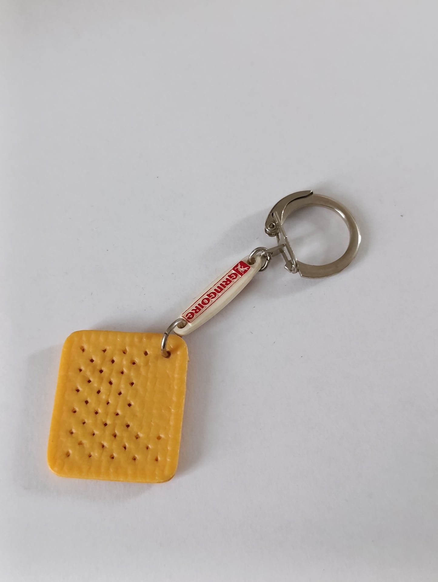 Porte-clés publicitaire ancien Gringoire biscuit petit-beurre