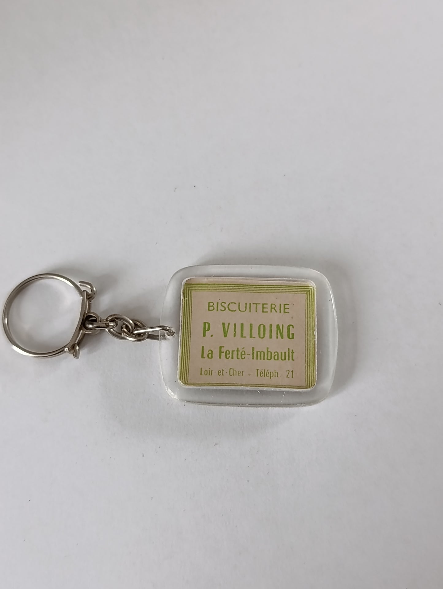 Porte-clés publicitaire ancien Sologne touristique / Biscuiterie P. Villoing – La Ferté-Imbault