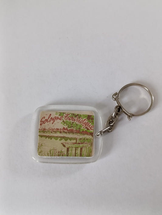 Porte-clés publicitaire ancien Sologne touristique / Biscuiterie P. Villoing – La Ferté-Imbault