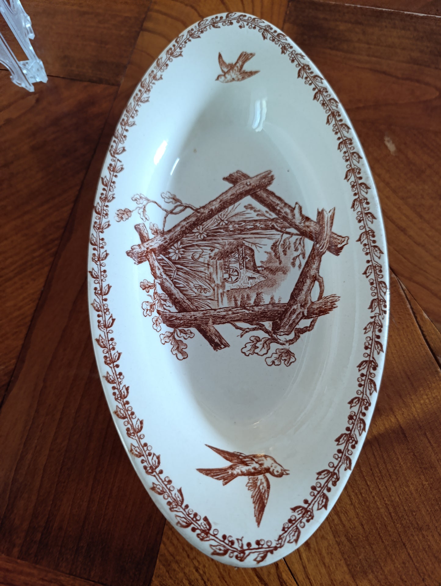 Petit plat ovale ancien Terre de Fer V. Sordoillet Paris décor champêtre brun 25 cm