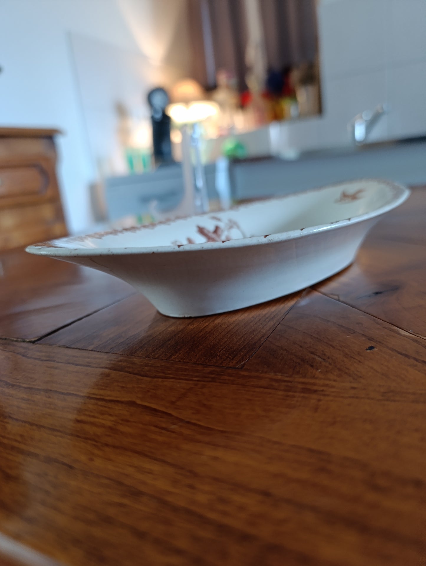 Petit plat ovale ancien Terre de Fer V. Sordoillet Paris décor champêtre brun 25 cm
