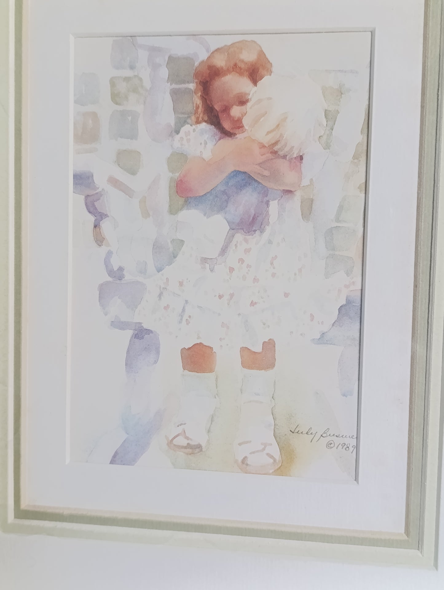 Tableau encadré enfant enlacé – reproduction d’aquarelle Lucy Dawson 1989 – 33,3 x 28,2 cm