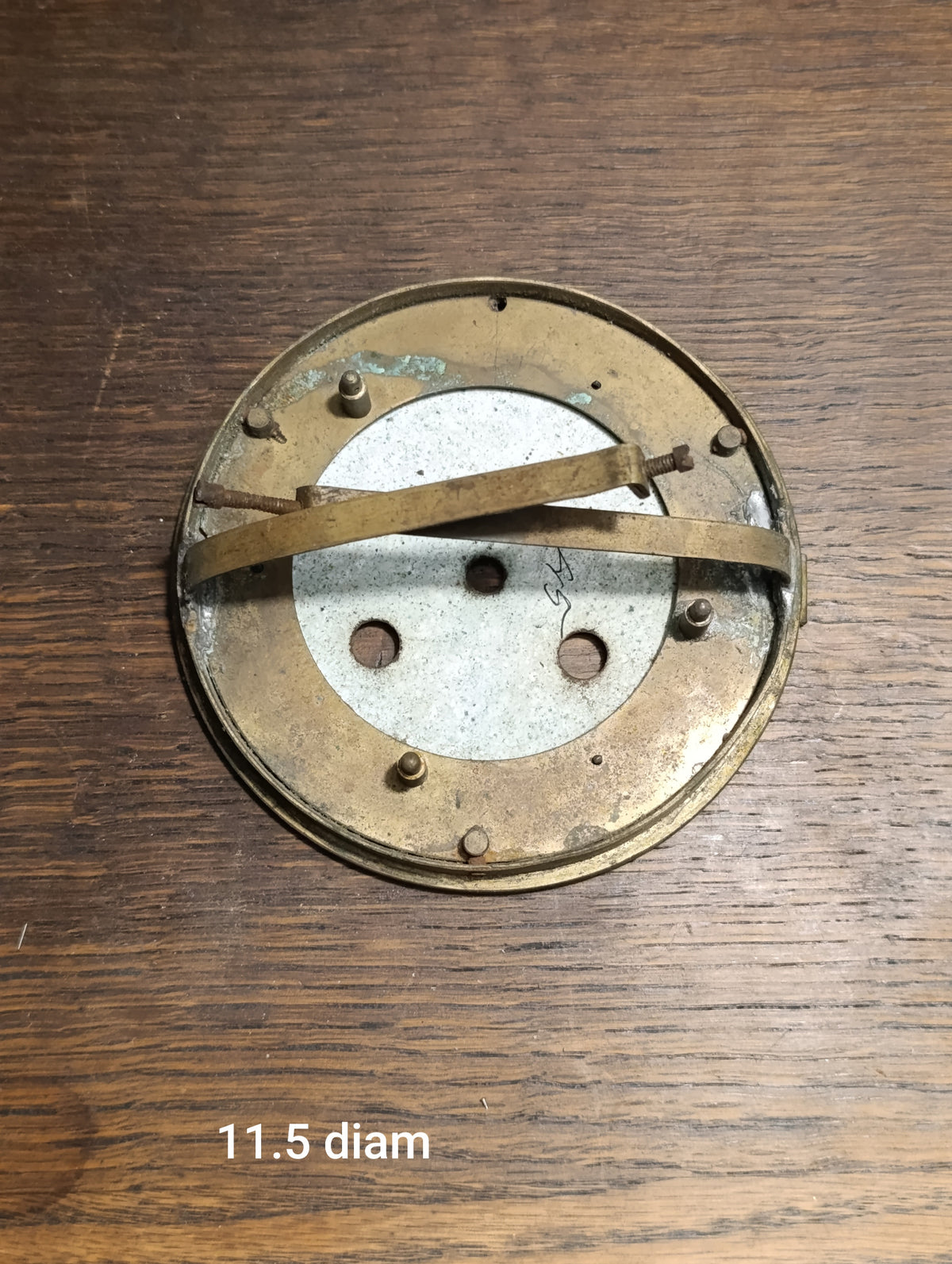 Cadran ancien de pendule émaillé à chiffres romains – diamètre 11,5 cm