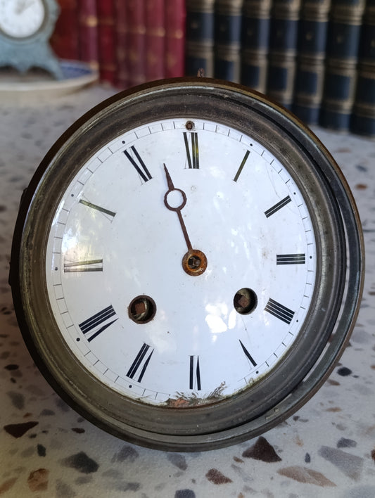 Mouvement de pendule ancienne ronde avec cadran émaillé à chiffres romains
