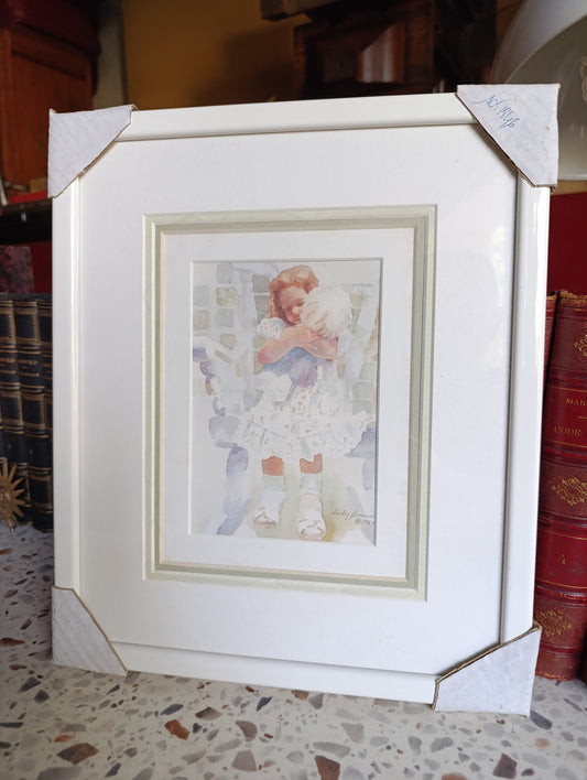 Tableau encadré enfant enlacé – reproduction d’aquarelle Lucy Dawson 1989 – 33,3 x 28,2 cm